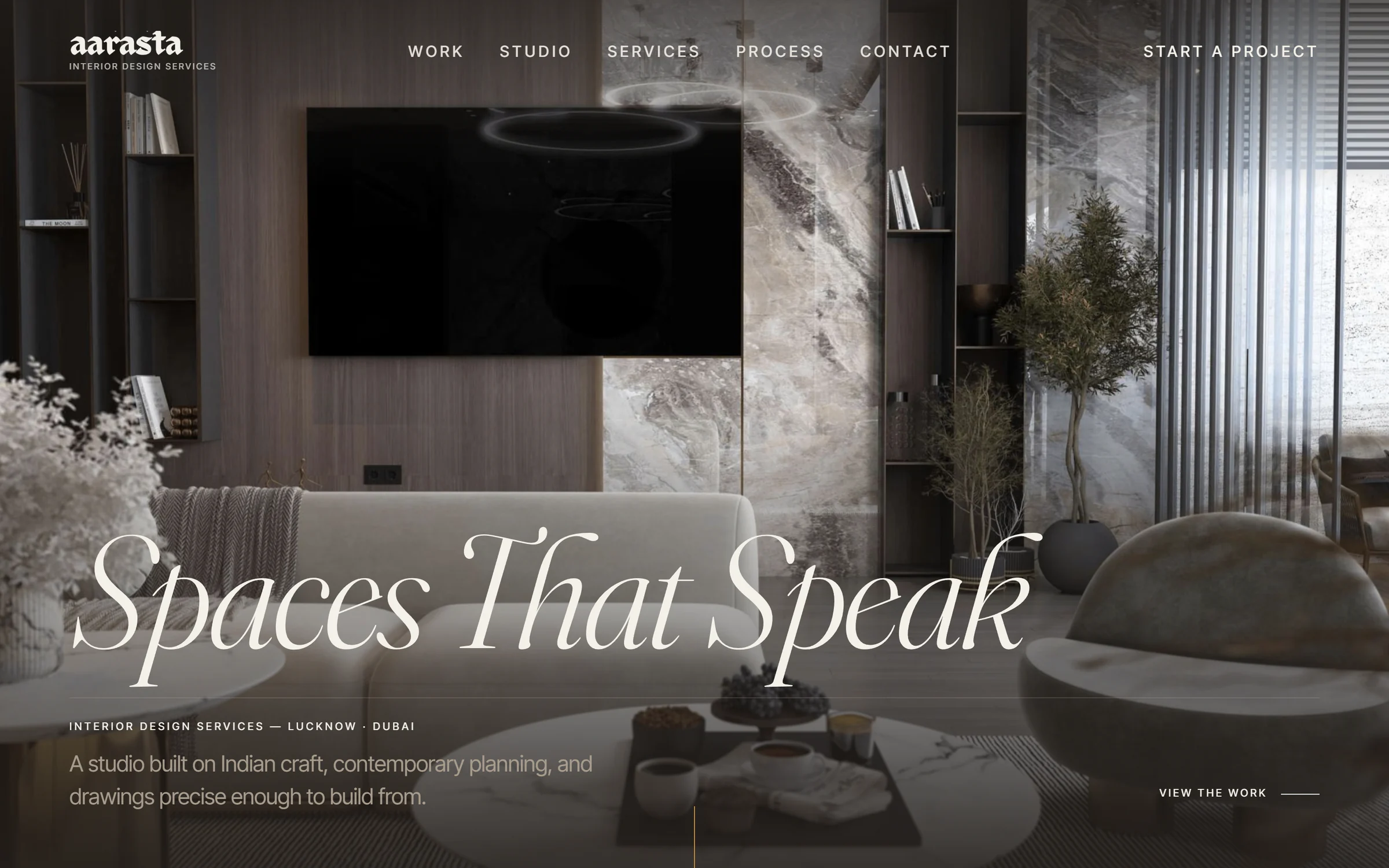 The Aarasta Interior homepage, showing a full-width render of a living room under the words Spaces That Speak.